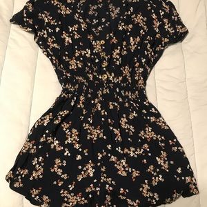 Navy blue floral print romper with pockets. Abercrombie and Fitch. Small
